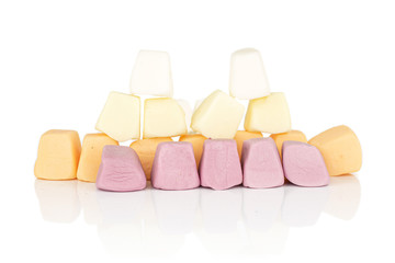 Lot of whole arranged soft pastel candy isolated on white background