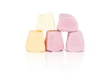 Group of five whole soft pastel candy isolated on white background