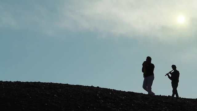 Marching Band Of Andean Musicians Playing In The Mountain.