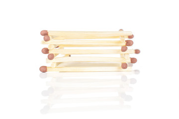Lot of whole brown safety match tower isolated on white background