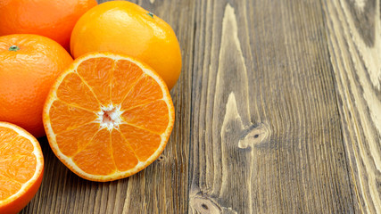 Orange fruit on a wooden table.