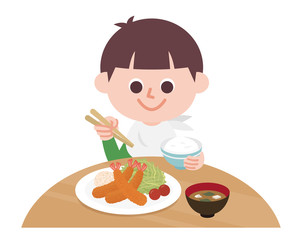 Boy eating fried shrimp set meal