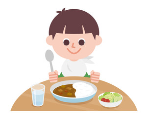 Boy eating curry and rice