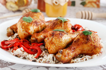 Indian cuisine: roasted chicken with rice and vegetables.