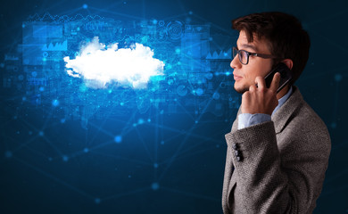 Person talking on the phone with blue cloud technology concept