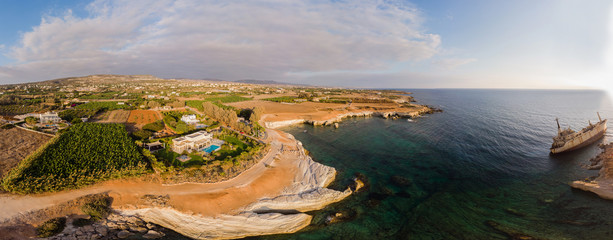 Aerial view of the abandoned ship EDRO III in Pegea, Paphos, Cyprus. Rusty shipwreck stranded on...