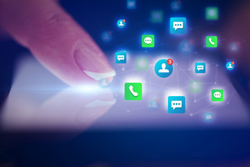 Finger touching phone with friends and contact concept and dark background