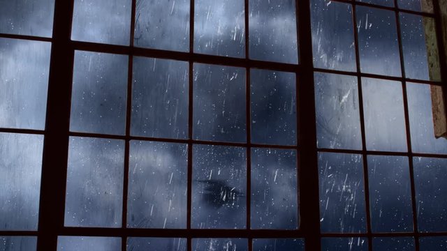 Scary Bat filled Sky Outside Old Factory Window 4K Loop features a view out of an old factory window of rolling clouds and bats flying with a full moon in a loop