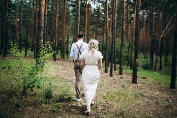 Beautiful wedding couple in a forest