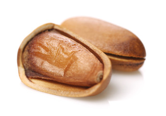 Pine nuts on white background