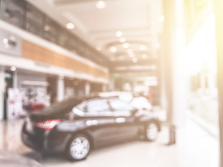 Blur image of car in the showroom