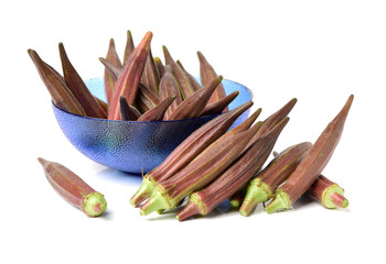 Red okra on white background