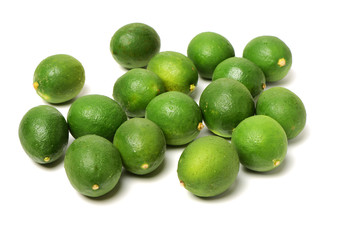 Fresh limes on white background