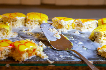 Set of yellow cakes on the table