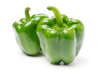 fresh green bell pepper (capsicum) on a white background