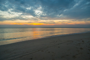 Siluette sunset at the beach background