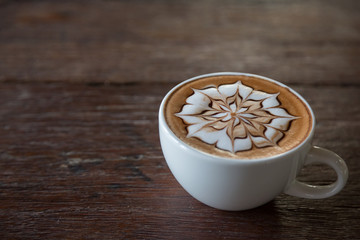 Cup of coffee with  latte art on top