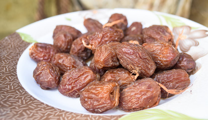 dates fruit in plate Ramadan sweet food close up