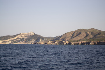 Fototapeta na wymiar View from the yacht to the Balearic Islands. Beautiful landscape in the Mediterranean Sea