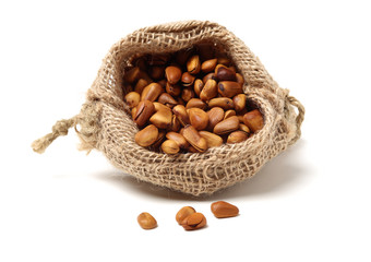 Pine nuts on white background