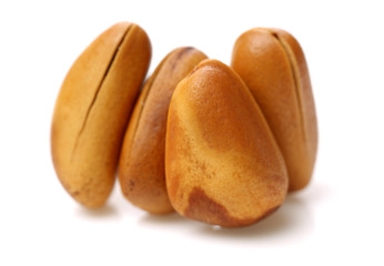 Pine nuts on white background