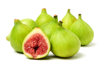 Ripe figs on a white background