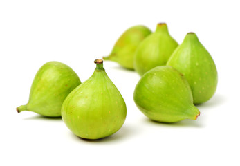 Ripe figs on a white background