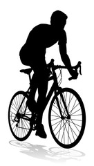 Obraz premium A bicycle riding bike cyclist in silhouette