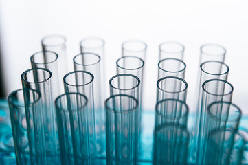 Science tubes arranged on the shelf.