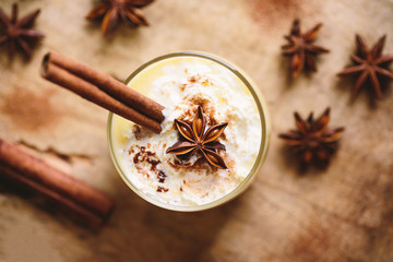 Eggnog with cinnamon and star anise for christmas  - obrazy, fototapety, plakaty