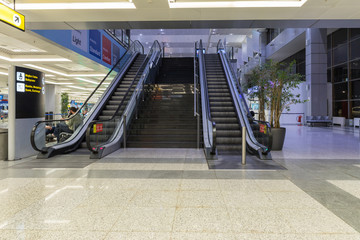Escalator leading to the upper floor in the check-in lounge at the Nikola Tesla International Airport near the city of Belgrade in Serbia
