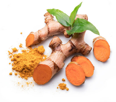 Fresh turmeric rhizome and turmeric powder isolated on white background.
