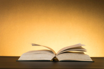 Symbolic hard study is powerful to succeed, concept with book and alarm clock. Time in business and quality