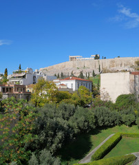 Parthenon ancient greek temple on acropolis of Athens under vibrant blue sky, view from the adiacent museum