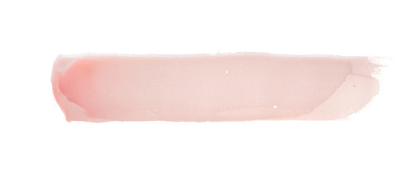 Delicate pink texture and strokes of a cosmetic face mask or cream on a white background