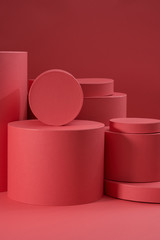 Abstract background composed of primitive volumetric objects of coral and red color