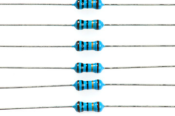 resistors closeup on white - concept of learning, training and development of electric circuits