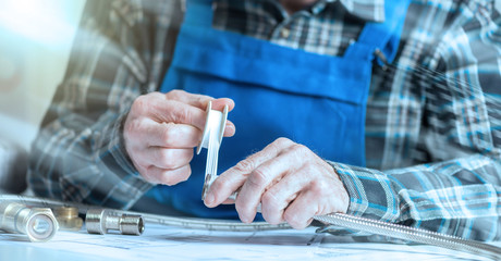 Plumber using teflon tape, light effect