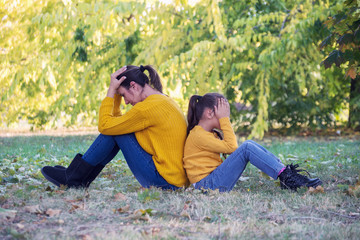 Angry mother and child girl not talking after fight