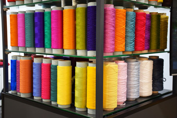 Group of Large colorful polypropylene threads set in rainbow mood. Multicolored bobbin thread....