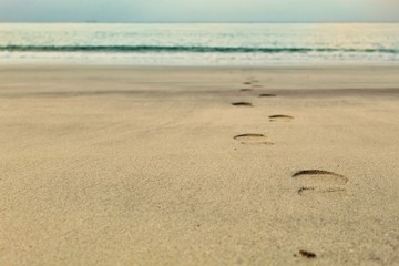 footprints on the beach