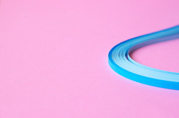 Pink background with blue abstract blue lines.