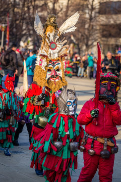 Mummers perform rituals to scare evil spirits at Surva festival at Pernik in Bulgaria. The people with the masks are called Kuker (kukeri). Children with masks.