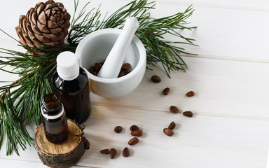 Top view, natural cosmetics, natural eco product, composition glass bottles with cedar oil, pine...
