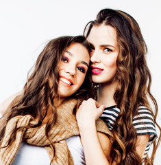 two best friends teenage girls together having fun, posing emotional on white background, besties happy smiling, making selfie, lifestyle people concept
