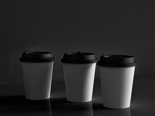 3d model of paper cups on the plane under natural light. Black background. 3d renderer.