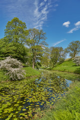Curved river flows through beautiful landscape near city of Fredericia in Denmark