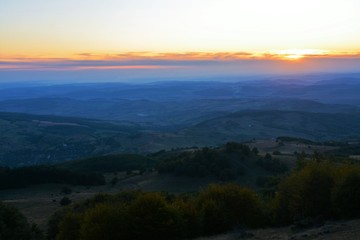 sunset over the hills and valleys in Transylvania