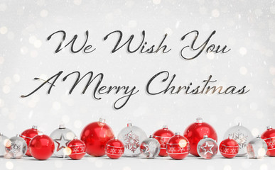 Christmas card greetings with red and white christmas baubles 3D rendering