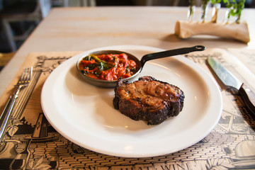 Beef steak with grilled vegetables served on plate